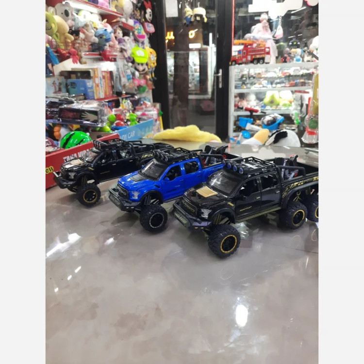 ماکت فلزی وانت فورد رپتور (F150) دوکابین شش در بازشو همراه با موتور (Ford raptor f150) شش چرخ موزیکال چراغدار