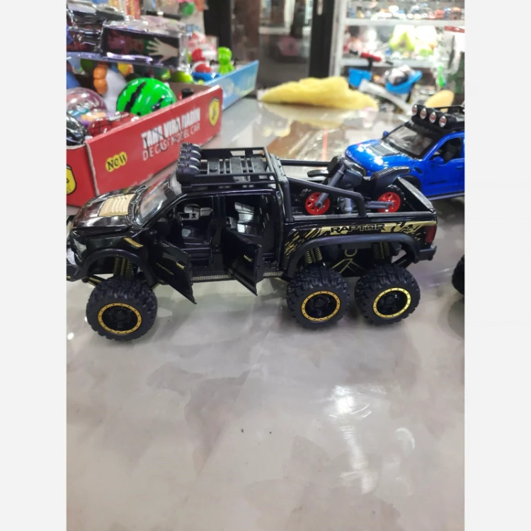 ماکت فلزی وانت فورد رپتور (F150) دوکابین شش در بازشو همراه با موتور (Ford raptor f150) شش چرخ موزیکال چراغدار