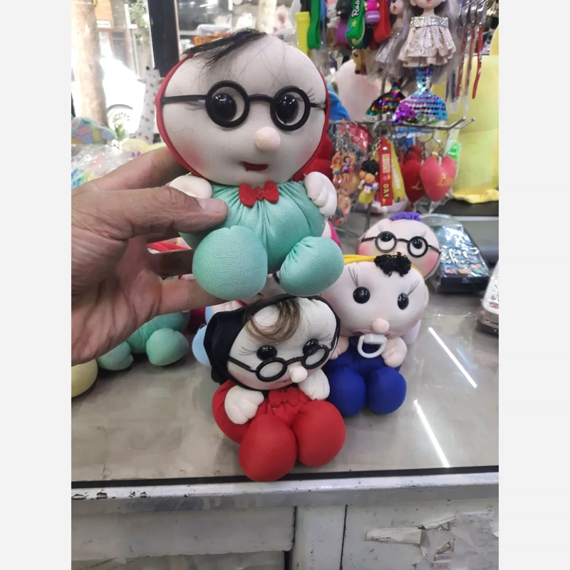 عروسک تپل خنگول در دو مدل عینکی و با پستونک