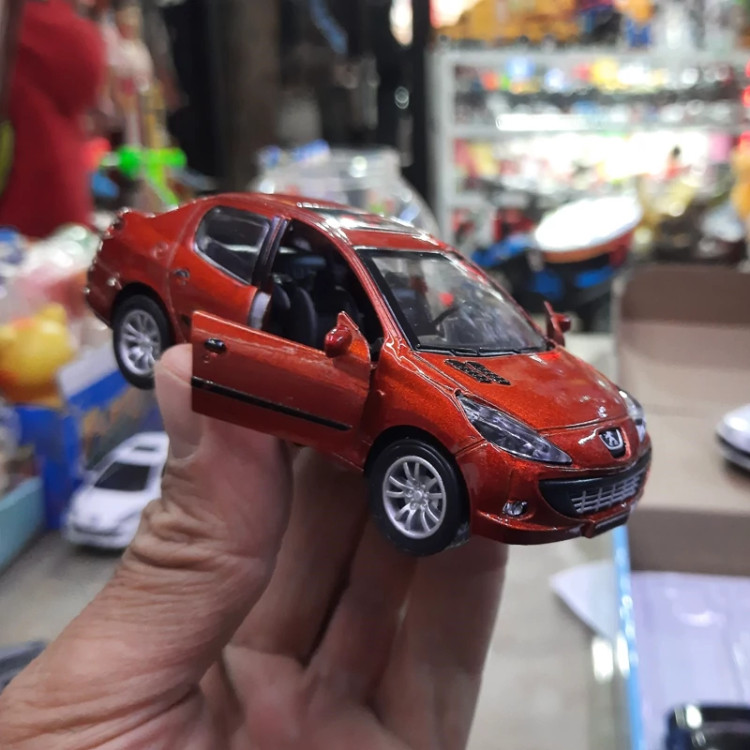 ماشین ماکت فلزی پژو 207 صندوق دار موزیکال چراغدار