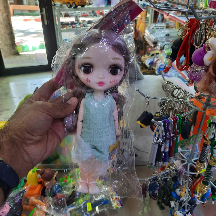 عروسک موزیکال چراغدار